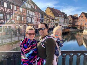 Courtney Suesse, Petty Officer 2nd Class Matthew Suesse, and their daughter, Stella, pictured in Colmar, France before the pandemic.