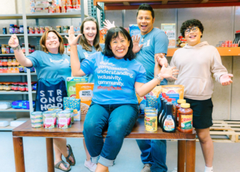 Bassett with Stronghold volunteers in the Fort Leavenworth pantry space. Photo courtesy: C. Ricard Photography