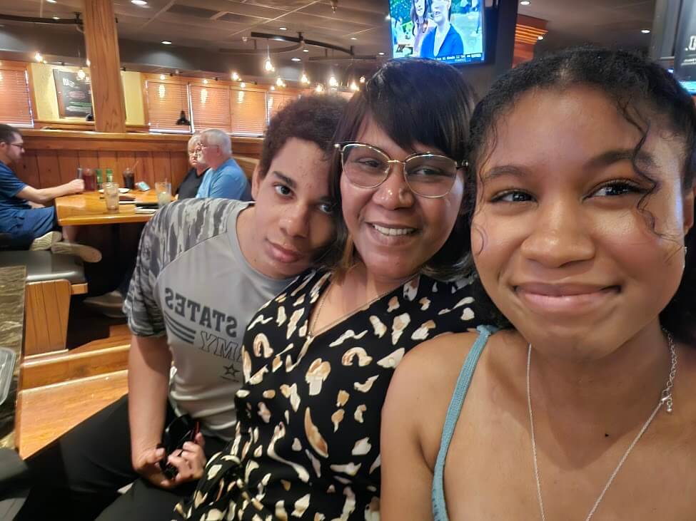 Pfc. Maury-Rice (left) with his mother and sister, who are grateful to the Soldier Recovery Unit for helping Maury-Rice recover from a stroke.