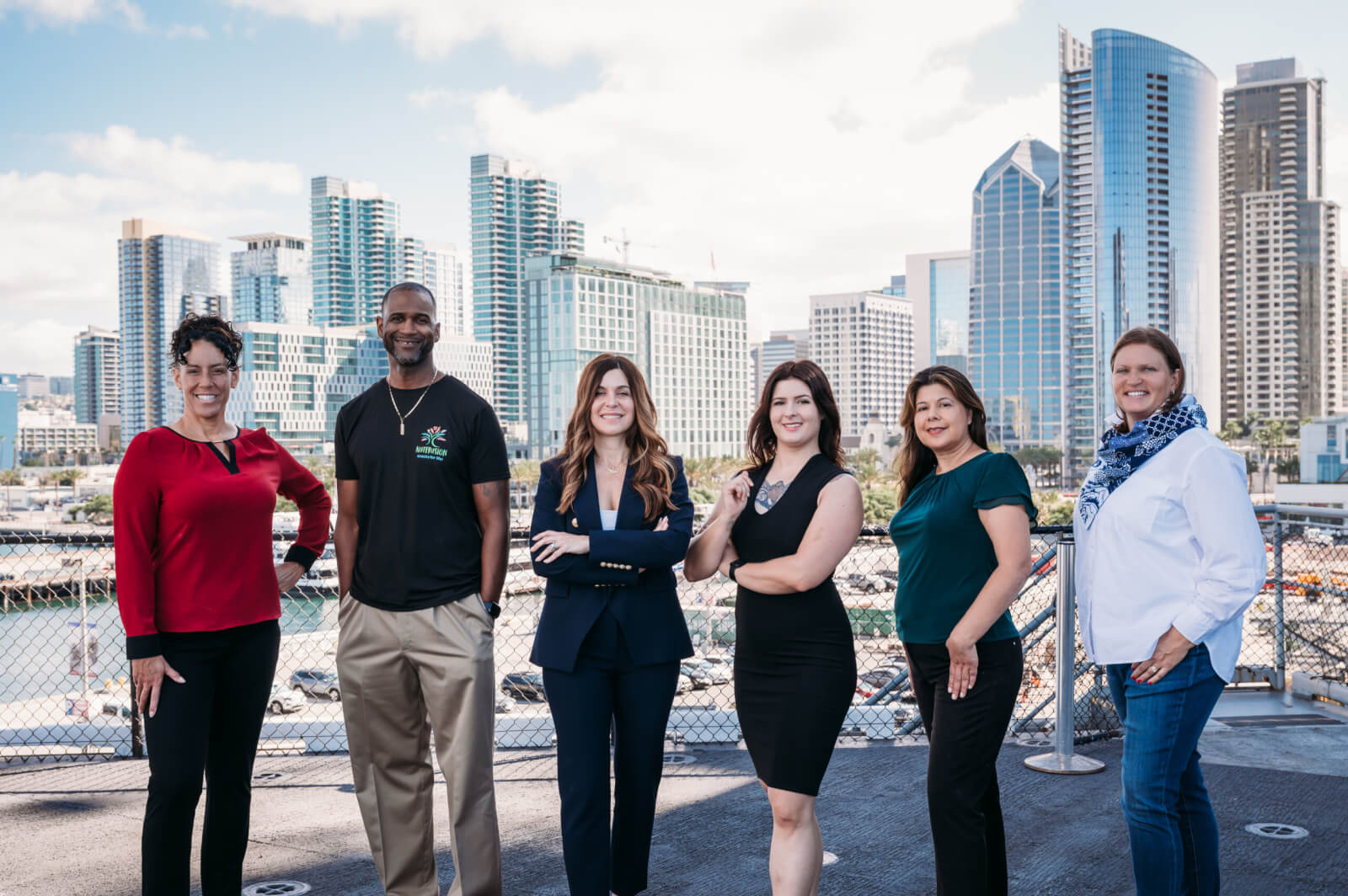 Military entrepreneurs in front of San Diego skyline