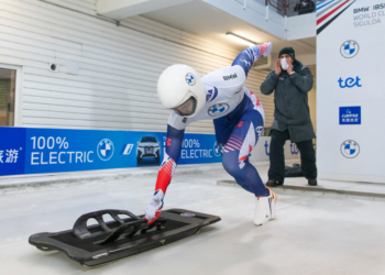 Kelly Curtis begins a run on a skeleton track as she trains for the Winter Olympics.