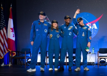 The Artemis II crew of Mission Specialist Jeremy Hansen from the CSA (Canadian Space Agency) and Mission Specialist Christina Koch, Pilot Victor Glover, and Commander Reid Wiseman from NASA are seen during a crew return event at Ellington Field in Houston, Texas.
