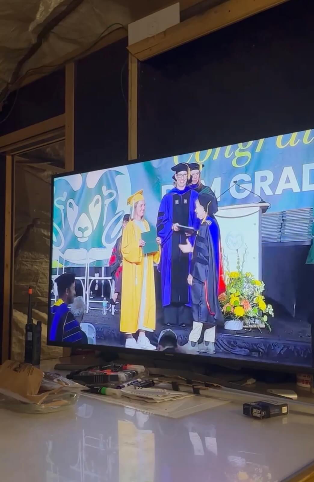 The author's husband watched her college graduation ceremony while he was deployed to the Middle East.