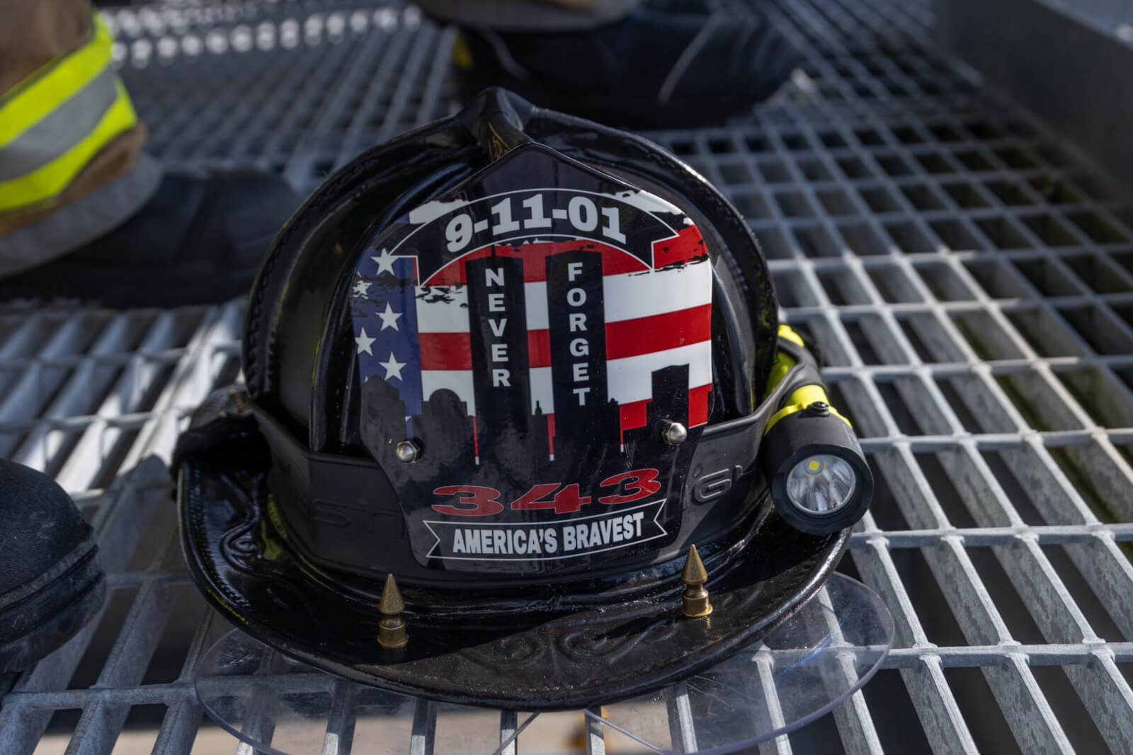 U.S. Marines with Aircraft Rescue and Firefighting, Headquarters and Headquarters Squadron, Marine Corps Air Station Beaufort, participate in their annual 9/11 remembrance physical training session on Marine Corps Air Station Beaufort, South Carolina on Sept. 11, 2025. U.S. Marine Corps photo by Cpl. Delilah M. Romayor.